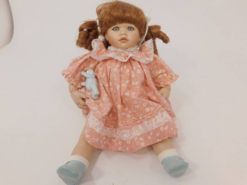 lot 91 image: Collectible Doll