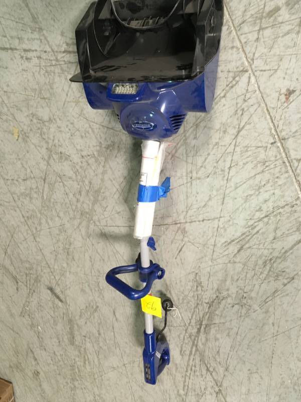 lot 92 image: Snow Joe 11 in. 10 Amp Electric Snow Blower Shovel with LED Light in like new condition