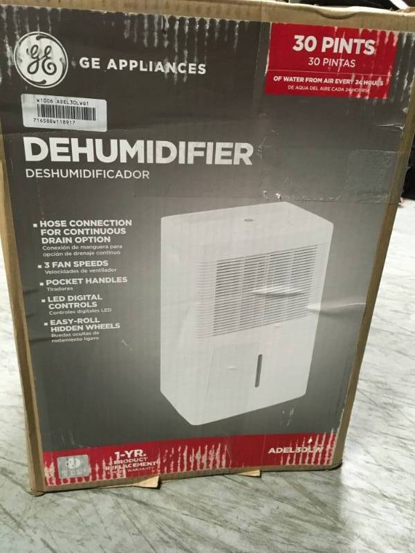lot 100 image: GE 30 pt. Dehumidifier in like new condition