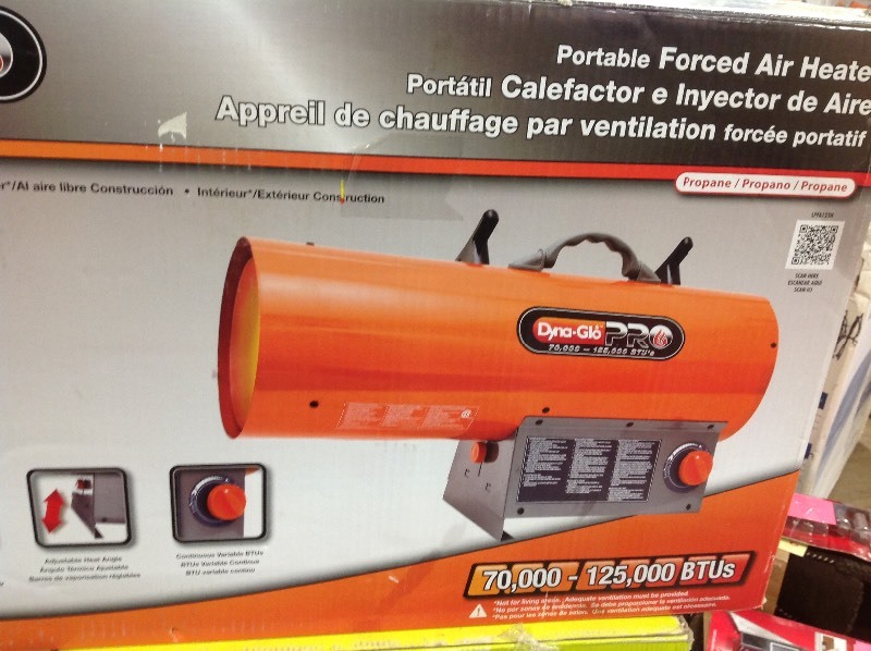 lot 115 image: Dyna-Glo Pro 125K BTU Forced Air LP Gas Portable Heater used in working conditions