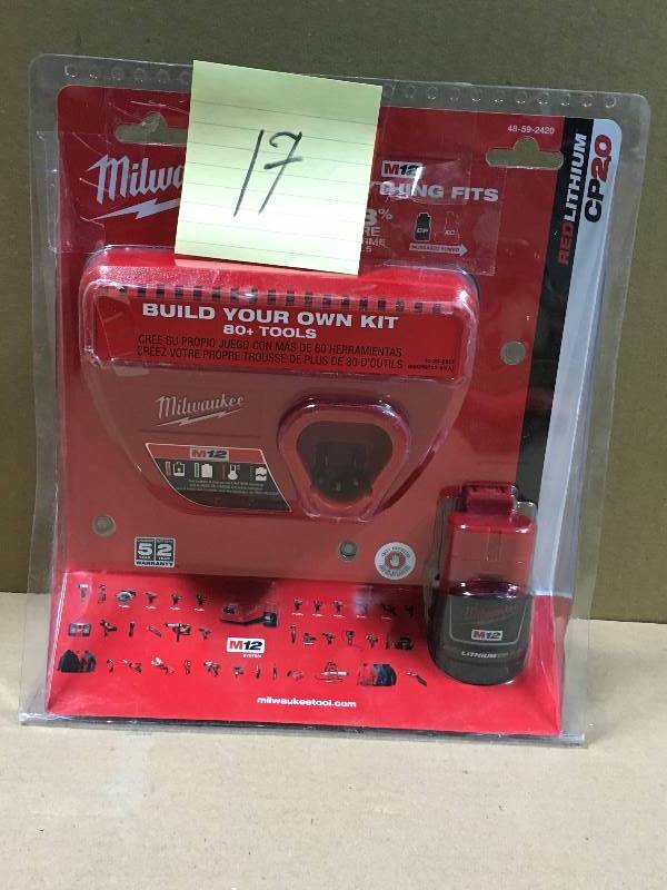 Milwaukee M12 12-Volt Lithium-Ion Compact Battery Pack 2.0Ah and Charger Starter Kit in working condition