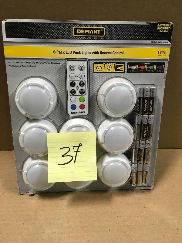Defiant LED 30 Lumen Puck Lights with Remote Control (8-Pack) in working condition