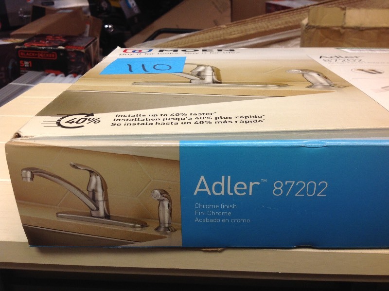 lot 110 image: MOEN Adler Single-Handle Low Arc Standard Kitchen Faucet with Side Sprayer in Chrome in good conditions