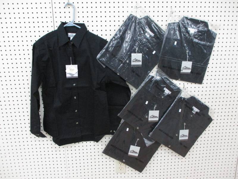 5 Size Medium Ladies Shirts new in Plastic. One on hanger is a display