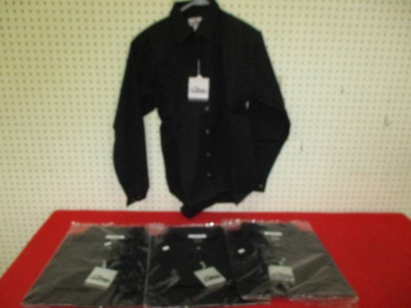 3 Size 2xLargel Ladies Shirts new in Plastic. Ones on hanger is a display