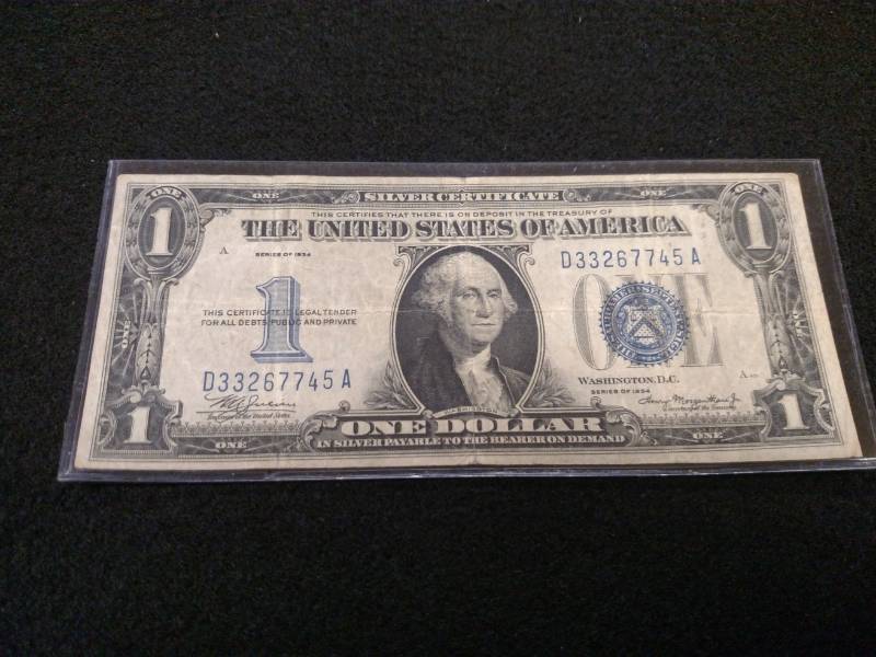 1934 Funny Back One Dollar Silver C...
