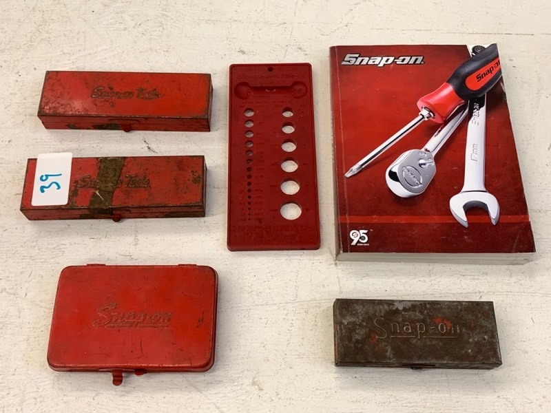 lot 39 image: (4) Snap-On Tool Cases, Snap-On Sizing Board, Snap-On Catalog