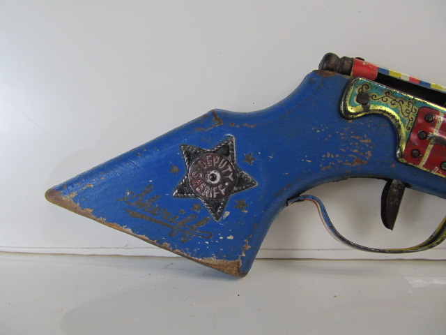lot 26 image: Vintage SHERIFF Tin Litho & Wood Toy Pistol