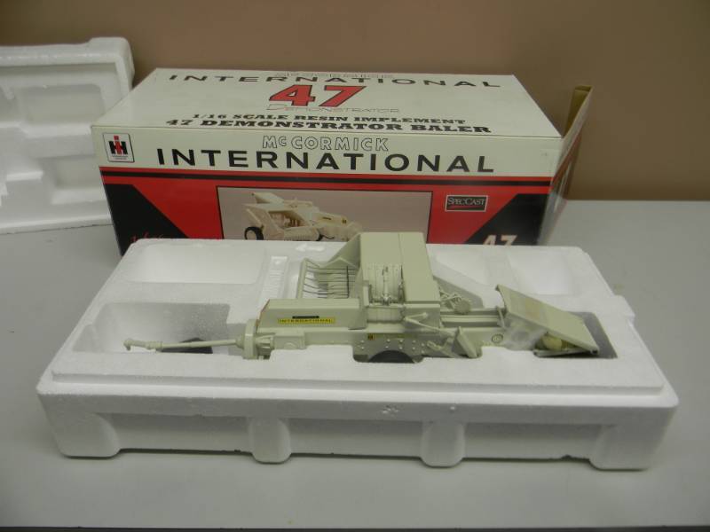 lot 6 image: McCORMICK INTERNATIONAL 47 DEMONSTRATOR 116 SCALE RESIN BALER - NEW IN BOX - SEE PICTURES
