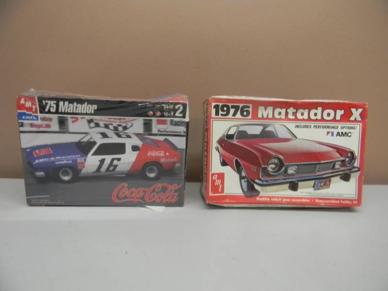 lot 44 image: AMT ERTL 125 SCALE 75 MATADOR COCA-COLA  MODEL KIT - SEALED NEW IN BOX & AMT 125 SCALE 1976 MATADOR X MODEL KIT (OPEN BUT EVERYTHING APPEARS TO BE IN BOX - SEE PICTURES