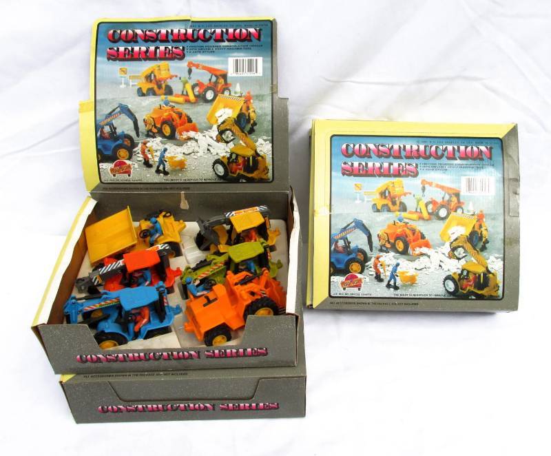 lot 69 image: Lot of Vintage 1991 Construction Series Friction Powered Vehicles
