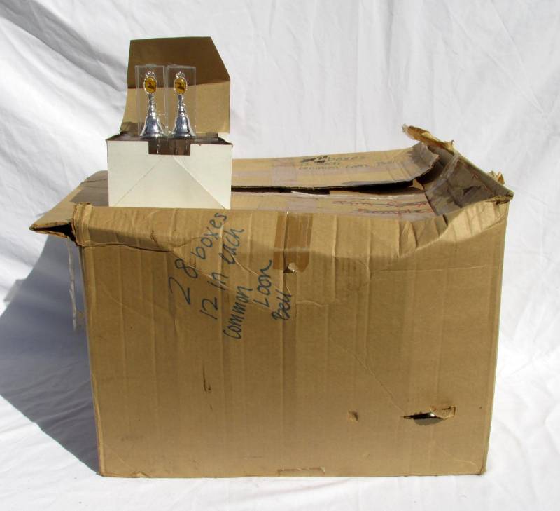 lot 73 image: Huge Case of New Common Loon Bells