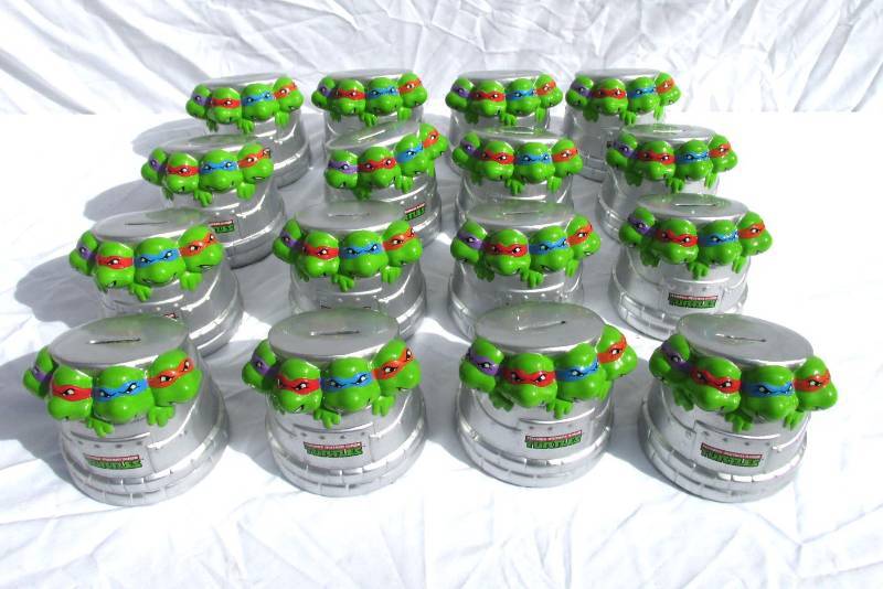 lot 14 image: Lot of 16 New Teenage Mutant Ninja Turtle Ceramic Banks