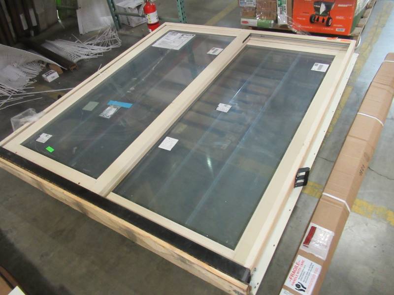 lot 158 image: Jeld-Wen Sliding Patio Door, White ExteriorBeige Interior. Measures 71 38 X 80 X 4 916 - Measurements Are Approximate.