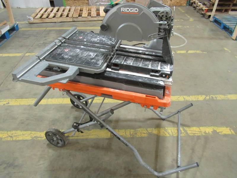 lot 41 image: RIDGID 10 in. Wet Tile Saw with Stand and Pump R4092 - Motor Does not work, Pump Works - Missing parts.