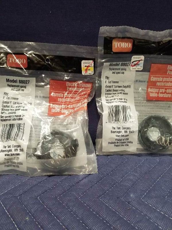 lot 70 image: Toro Electric Trimmer Replacment Spring & Spool Cap
