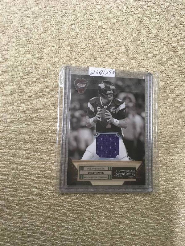 lot 24 image: Timeless Treasures Brett Favre Jersey Relic Card - 209250