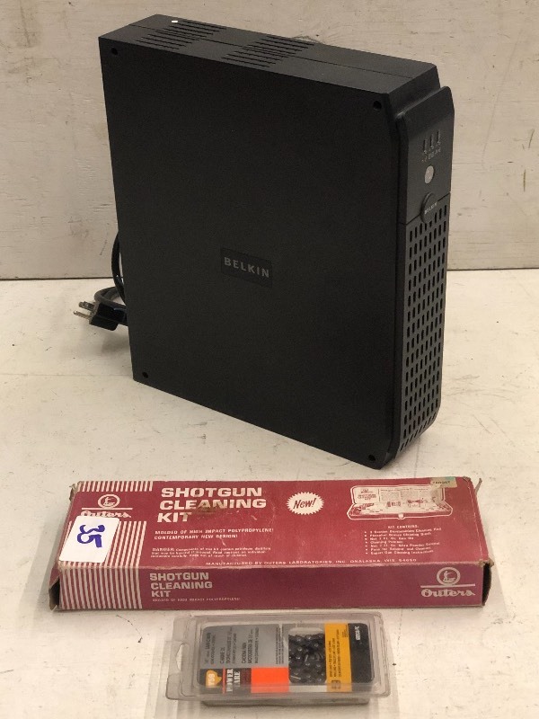 lot 35 image: Belkin Battery Back-Up, Chainsaw Chain, Shotgun Cleaning Kit