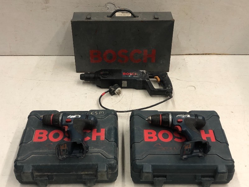 lot 39 image: Tote Of Bosch Hammer Drill, Bosch Drills, Cases, Etc