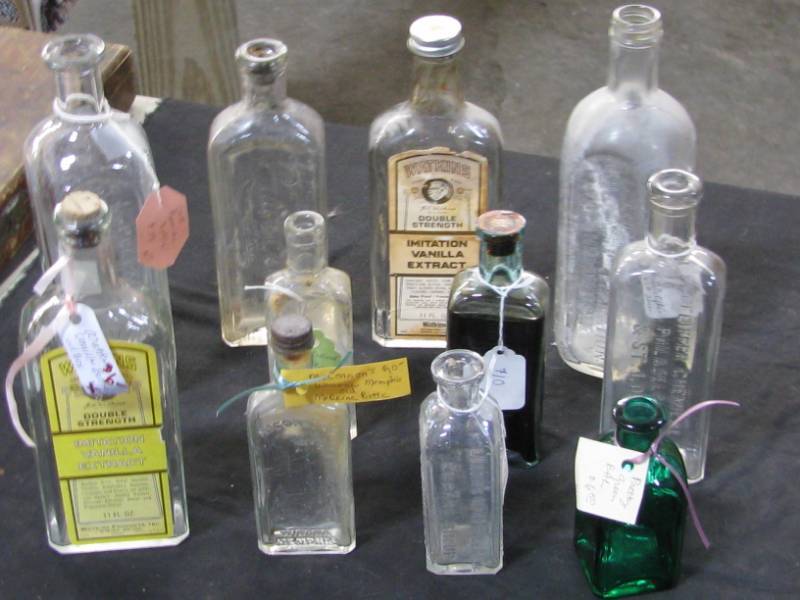 lot 13 image: Advertising Bottles