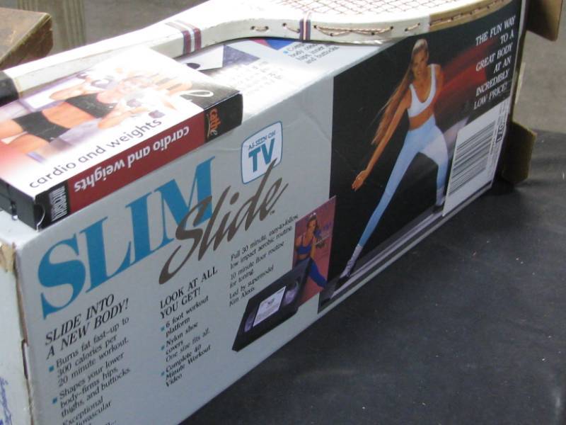 lot 87 image: Slim Slide & Tennis Racket