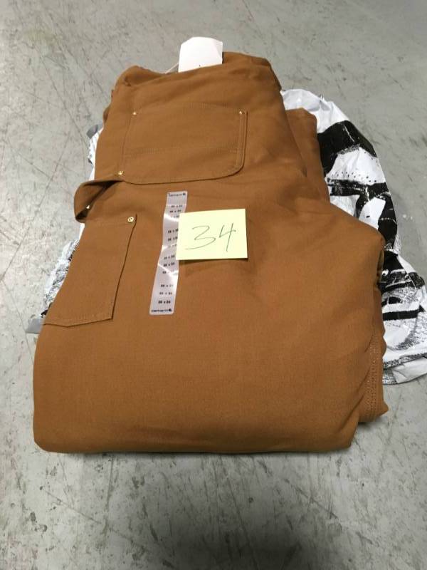 lot 34 image: Carhartt MenS 38 in x 34 in. Carhartt Brown Cotton Arctic Quilt Lined Duck Bib Overalls in very good condition
