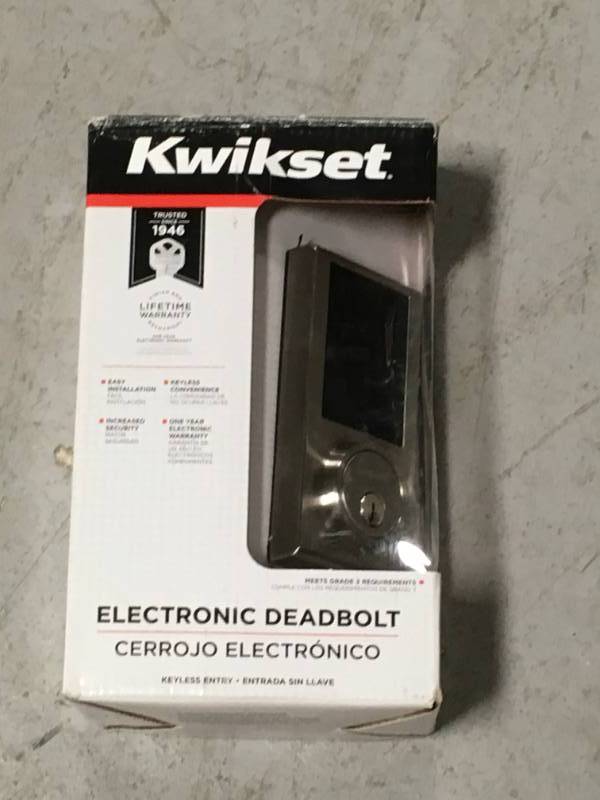 lot 49 image: Kwikset Limited Edition Satin Nickel Single Cylinder Contemporary Square Touchscreen Deadbolt in very good condition