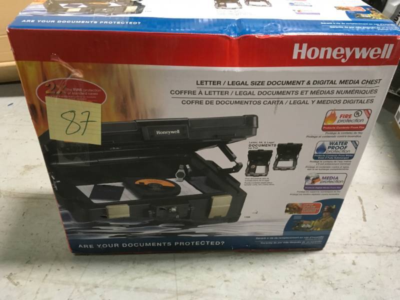 lot 87 image: Honeywell 0.39 cu. ft. Molded Fire Resistant and Waterproof Legal Document Storage Chest with Key and Double Latch Lock in very good condition