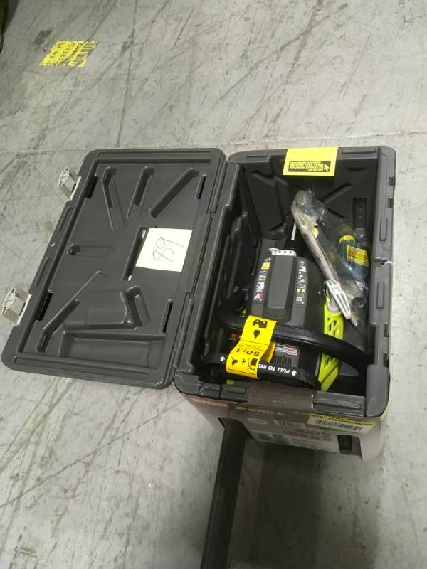 lot 89 image: RYOBI 18 in. 38cc 2-Cycle Gas Chainsaw with Heavy Duty Case in very good condition