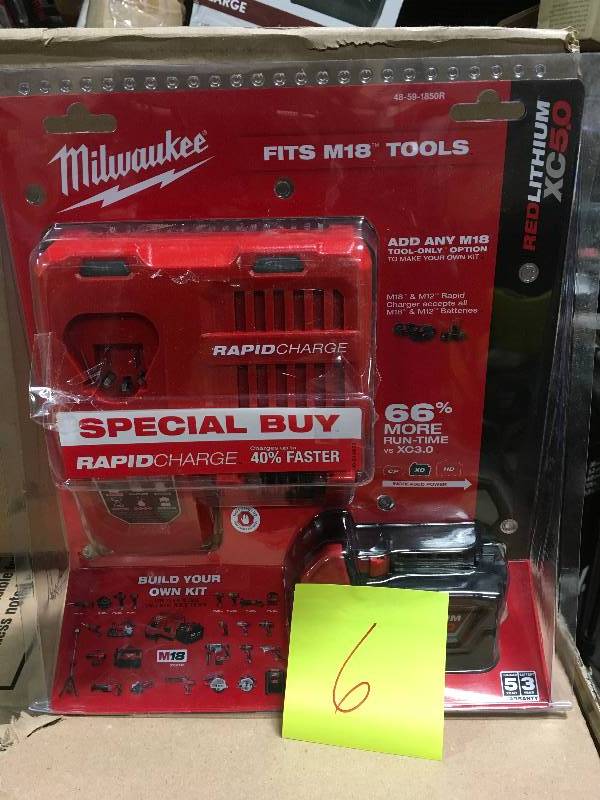 lot 6 image: Milwaukee M18 18-Volt Lithium-Ion XC Starter Kit with (1) 5.0Ah Battery and Charger in very good condition
