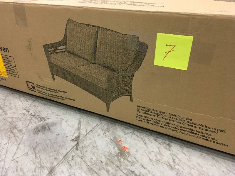 lot 7 image: Hampton Bay Spring Haven Brown All-Weather Wicker Outdoor Patio Loveseat with Sky Blue Cushions in very good condition