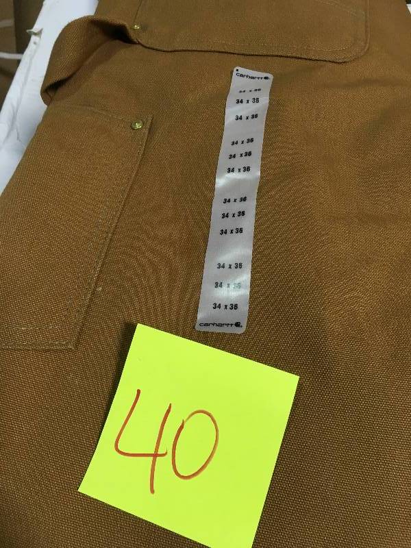 lot 40 image: Carhartt MenS 34 in x 36 in. Carhartt Brown Cotton Arctic Quilt Lined Duck Bib Overalls in very good condition