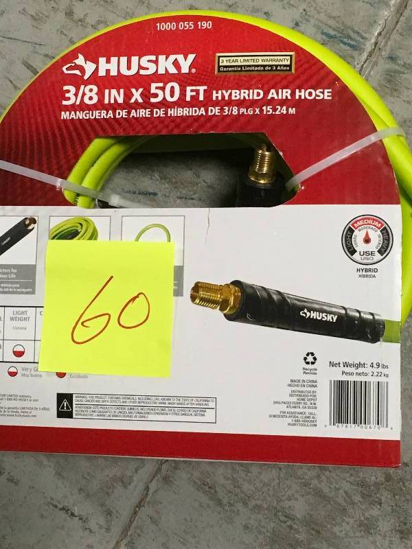 lot 60 image: Husky 38 in. x 50 ft. Hybrid Air Hose not used