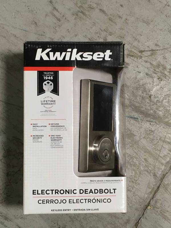 lot 74 image: Kwikset Limited Edition Satin Nickel Single Cylinder Contemporary Square Touchscreen Deadbolt