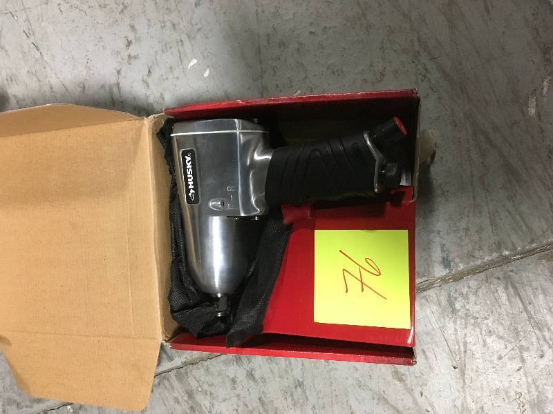 lot 76 image: Husky 12 in. 300 ft. lbs. Impact Wrench in very good condition