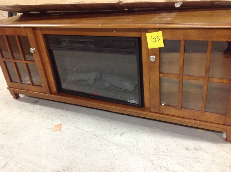 lot 105 image: Home Decorators Collection Westcliff 66 in. Lowboy TV Stand Electric Fireplace in Chestnut WHIT SMALL SCRATCH AND DENTS in working conditions