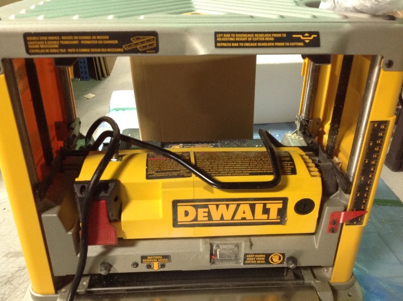 lot 107 image: DEWALT 15 Amp 12-12 in. Corded Planer in working conditions