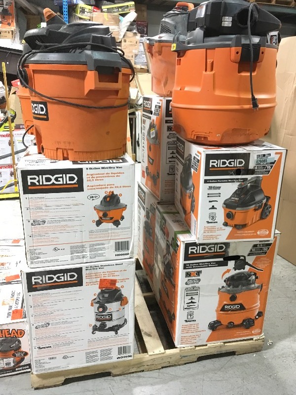 lot 122 image: Pallet of salvage vaccums for parts o repair