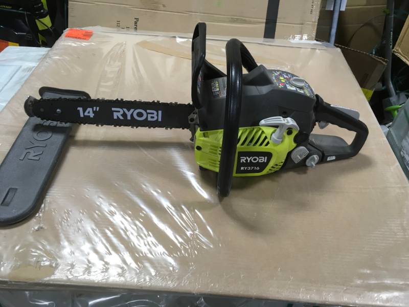 lot 63 image: RYOBI 16 in. 37cc 2-Cycle Gas Chainsaw with Heavy-Duty Case in very  good condition