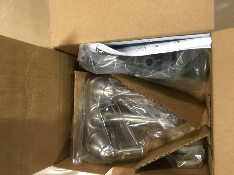 lot 65 image: MOEN Banbury 4 in. Centerset 2-Handle Low-Arc Bathroom Faucet in Spot Resist Brushed Nickel in very  good condition