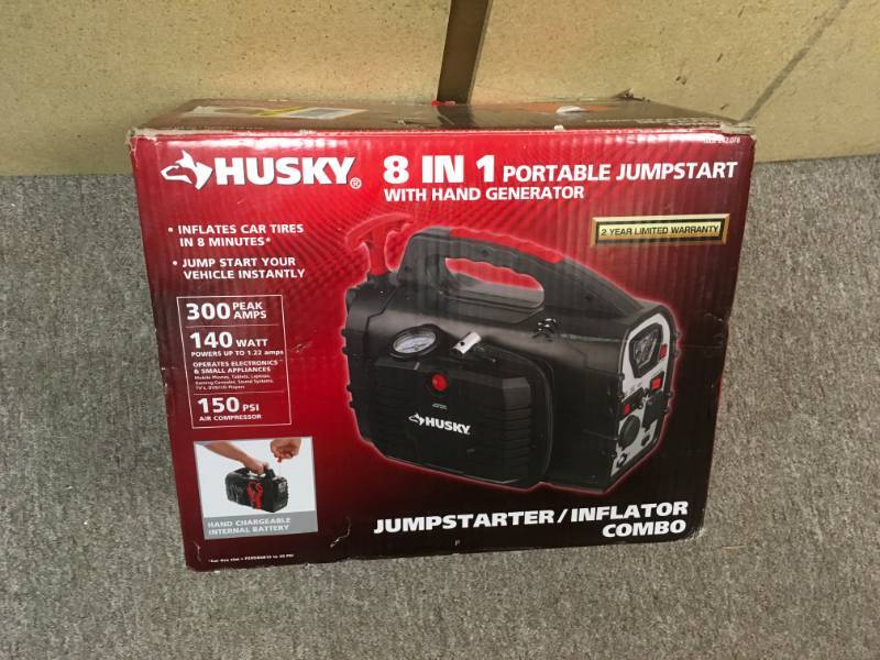 lot 75 image: Husky 8-in-1 12-Volt Power SourceJumpstarter in very  good condition