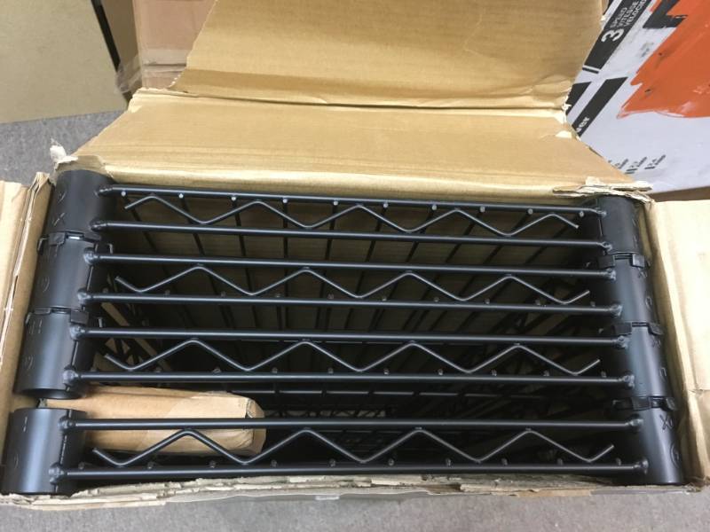 lot 95 image: HDX 54 in. H x 36 in. W x 14 in. D 4-Shelf Wire Unit in Black in very  good condition