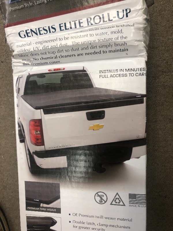 lot 113 image: Lund Genesis Elite Roll-Up 2002 to 2017 Dodge Ram 1500 Roll-Up Tonneau Cover in good conditions