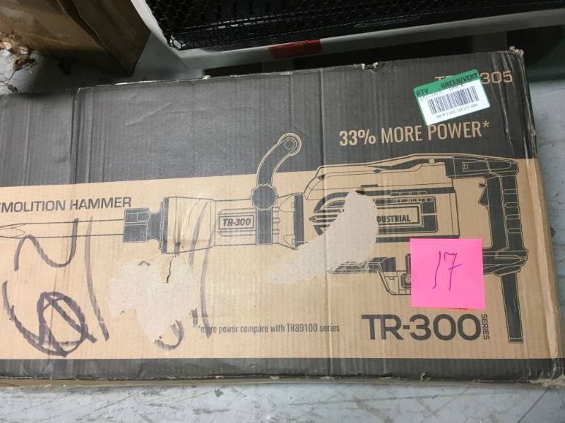 lot 17 image: TR Industrial 13 Amp 35 lbs. Demolition Jack Hammer in good working condition
