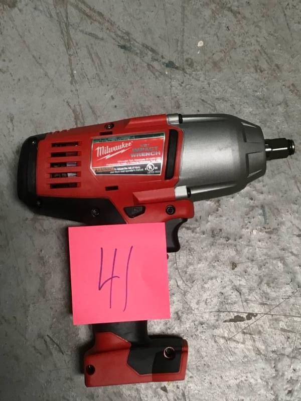 lot 41 image: Milwaukee M18 18-Volt Lithium-Ion Cordless 12 in. Impact Wrench W Friction Ring (Tool-Only) in good working condition