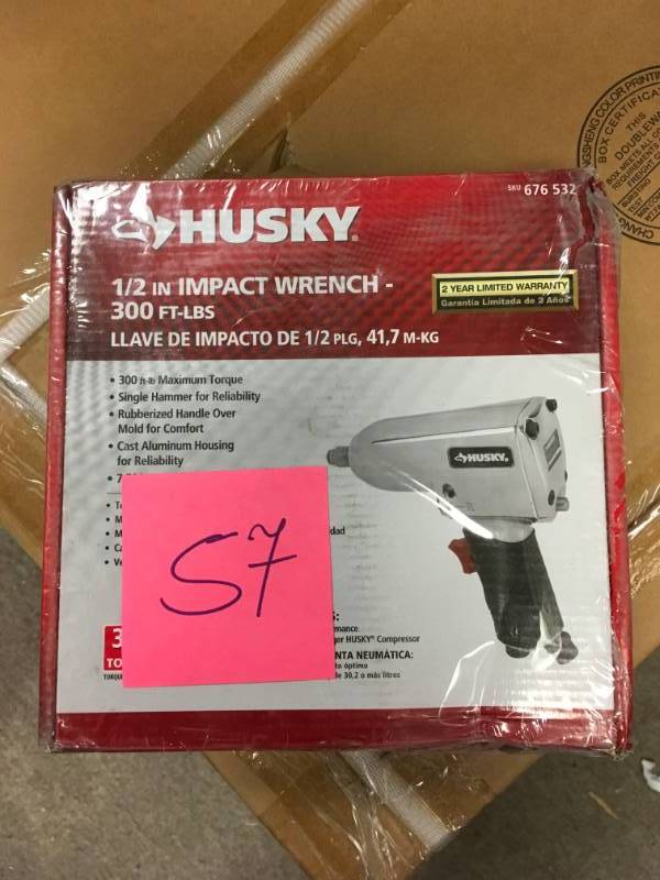 lot 57 image: Husky 12 in. 300 ft. lbs. Impact Wrench in good working condition