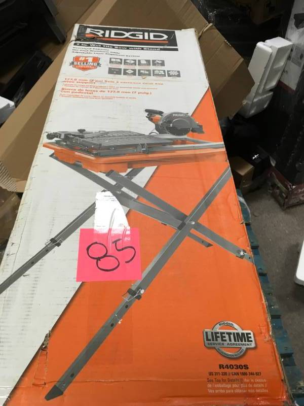lot 85 image: RIDGID 7 in. Tile Saw with Stand in good working condition