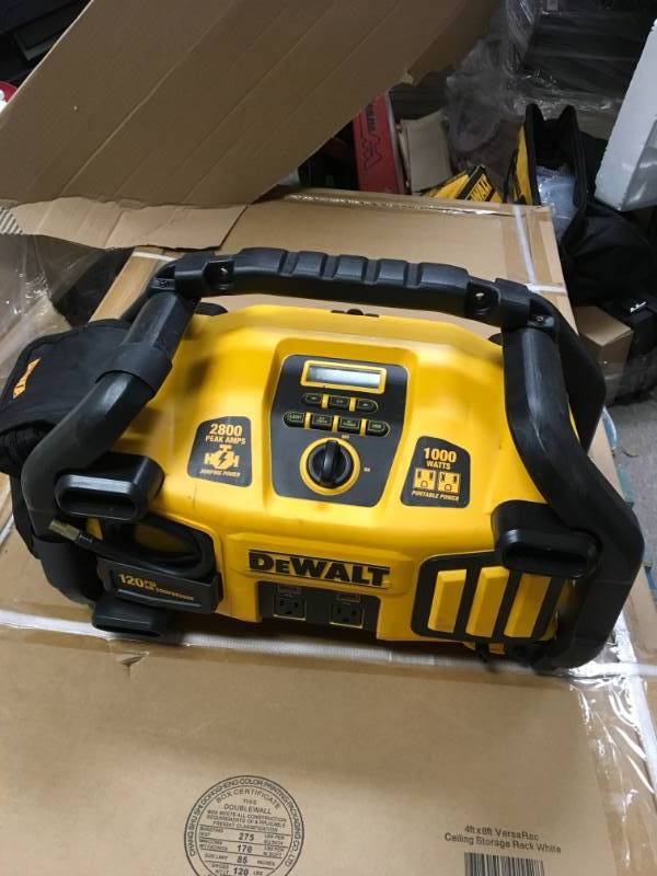 lot 97 image: DEWALT 2800 Peak Amp Jump Starter 1000-Watt Power Inverter with Digital Compressor  in good working condition