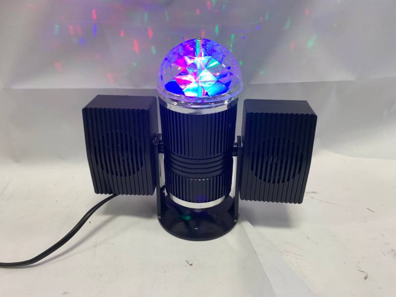 lot 34 image: Spinning Party Light with Dual Bluetooth Speakers