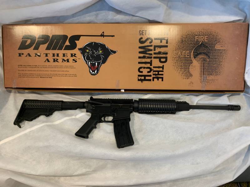 lot 20 image: DPMS AR15 .223.556 Rifle with Adjustable Stock and 30 Round Magazine